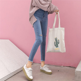 女式牛仔裤女 小脚裤 紧身毛边