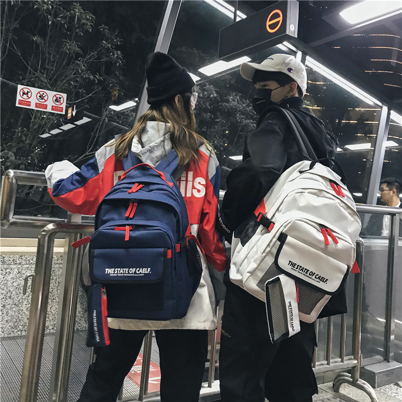 潮牌原创书包男时尚潮流大容量双肩包女高中学生韩版旅行休闲背包