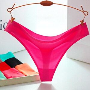 五送一丁字裤低腰三角女士内裤一片式无痕全透明蕾丝冰丝隐形裤