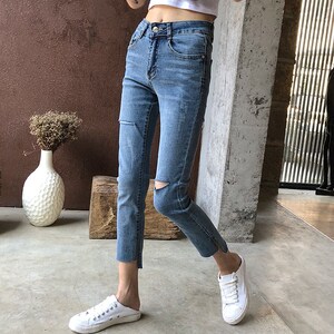 【时尚裤脚开叉牛仔裤女图片】时尚裤脚开叉牛仔裤女图片大全_好便宜